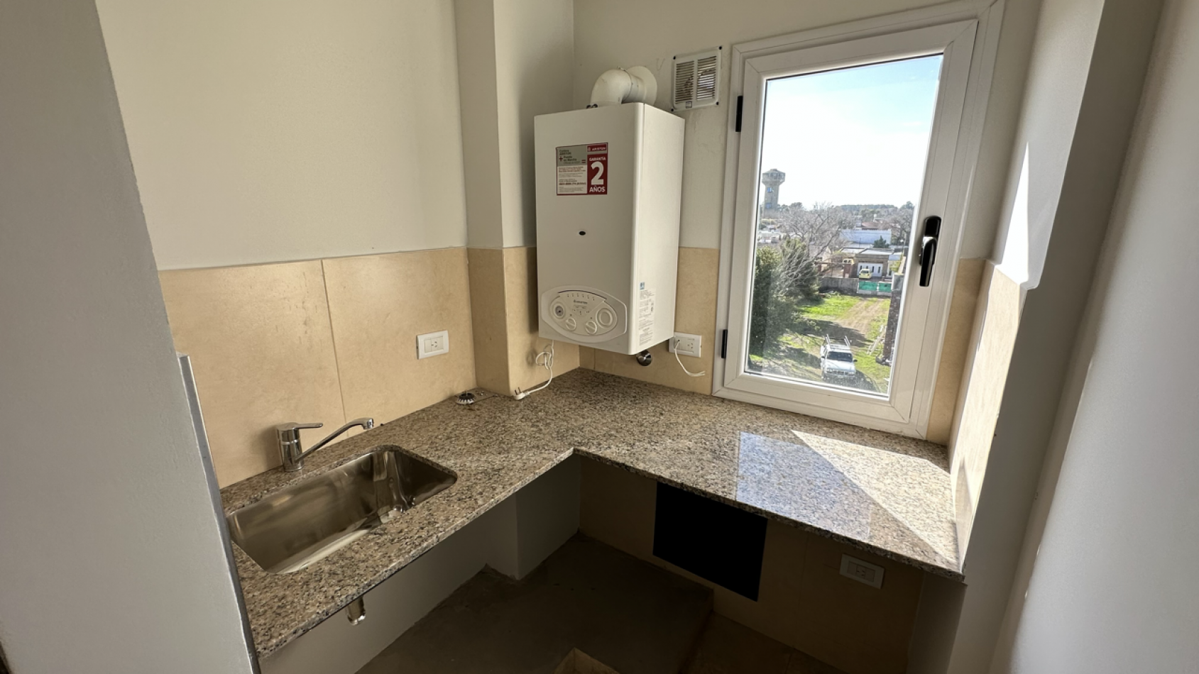 Depto 2 ambientes venta en General Belgrano con cochera