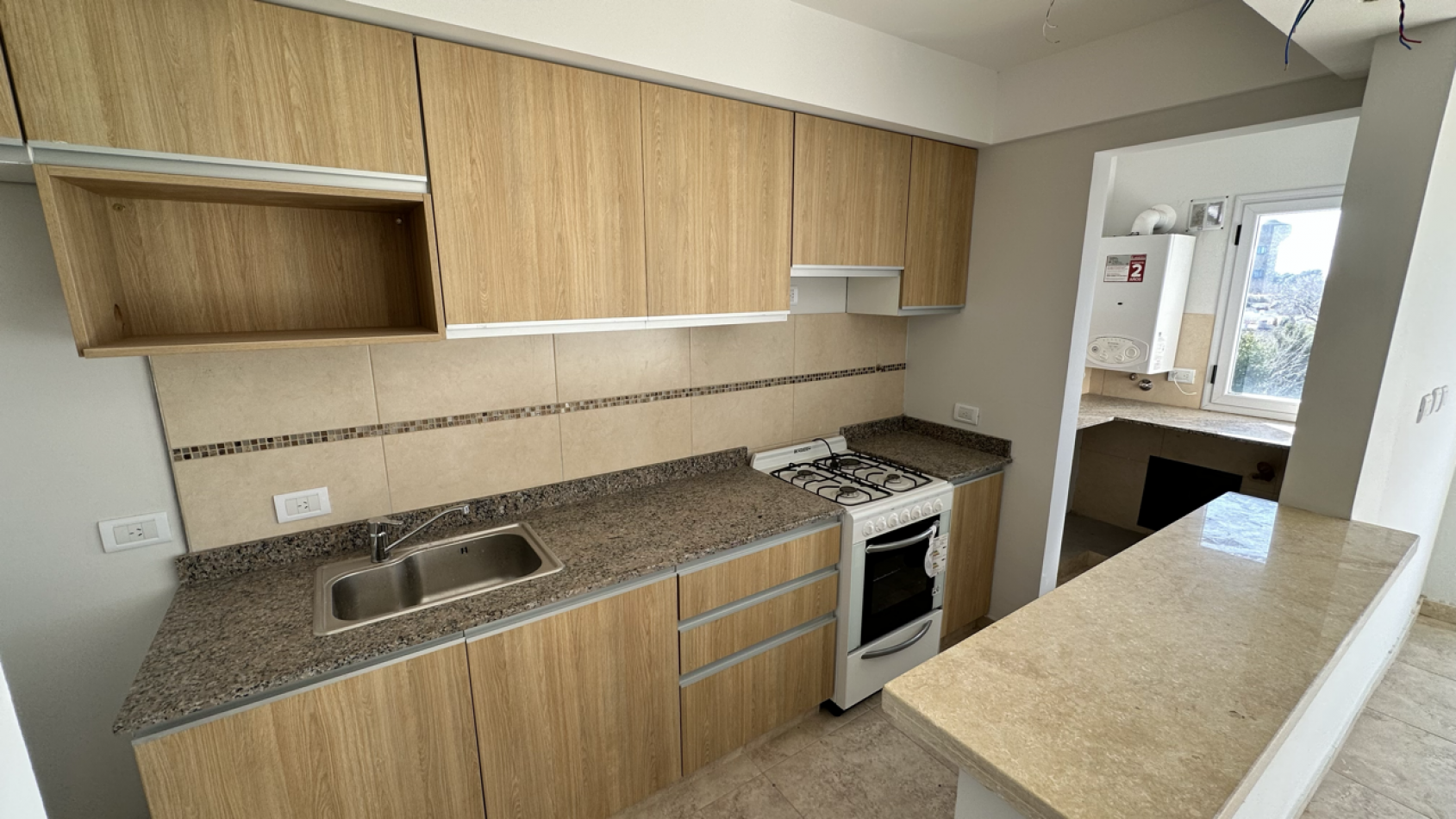 Depto 2 ambientes venta en General Belgrano con cochera